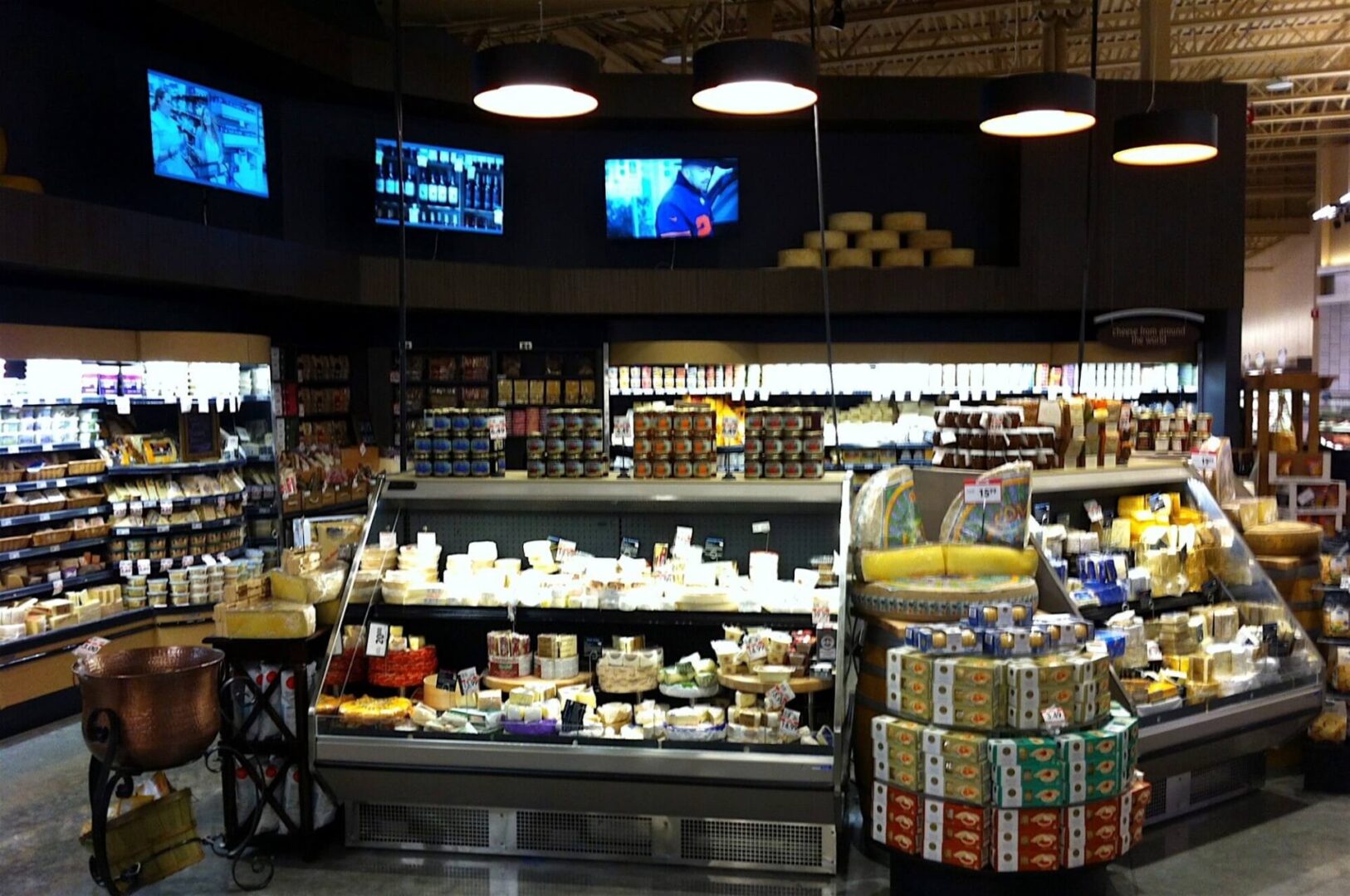 A store with many different types of cheese.